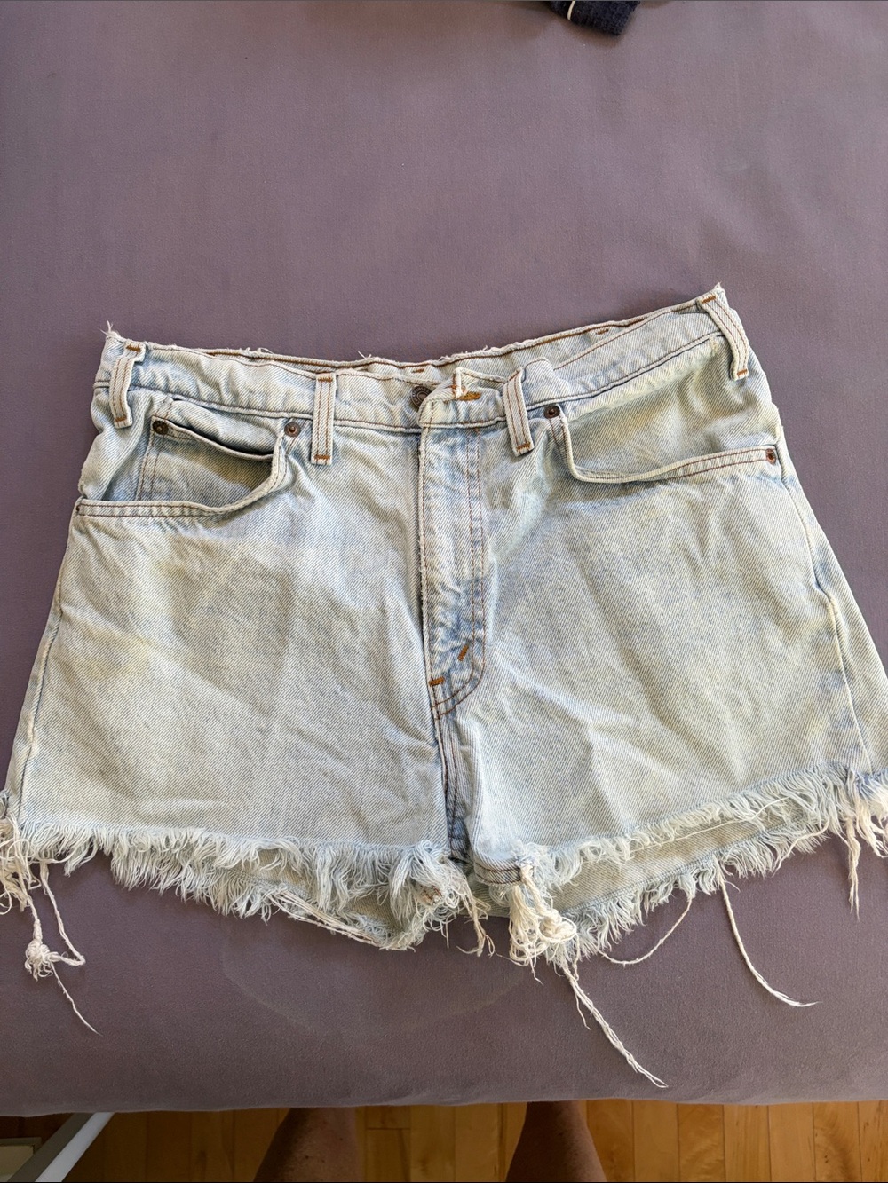 Vintage Levi’s orange label Light Wash Denim Frayed Hem shorts